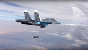 U.S., Russian warplanes warily share skies over Syria