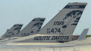 F-16 jet breaks after sliding off runway; pilot safe