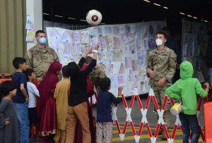 One Afghan evacuee in custody as European bases process 38,000 evacuees