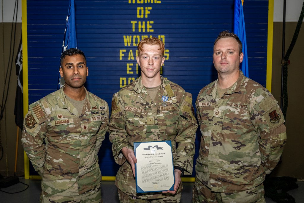 Airman awarded medal for aid in capture of fugitive accused of murder