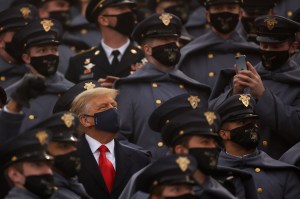Trump repeats his vow to veto the defense budget bill, but won’t say when