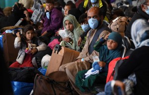 Money for Afghan refugees but not military pay boost in latest federal budget plan