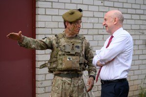 UK defense secretary resigns in protest of government spending plan