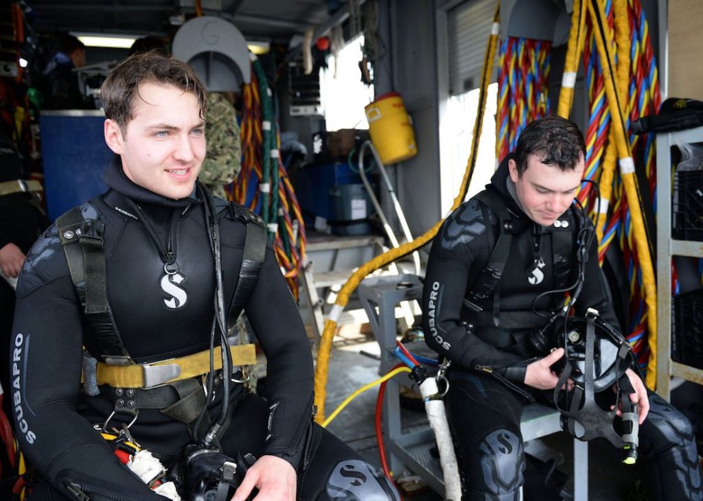 Navy divers rescue driver who plunged Jeep into frigid lake