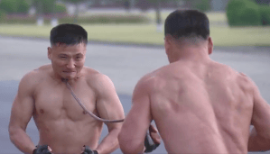 Watch North Korean soldiers obliterate bricks with their heads