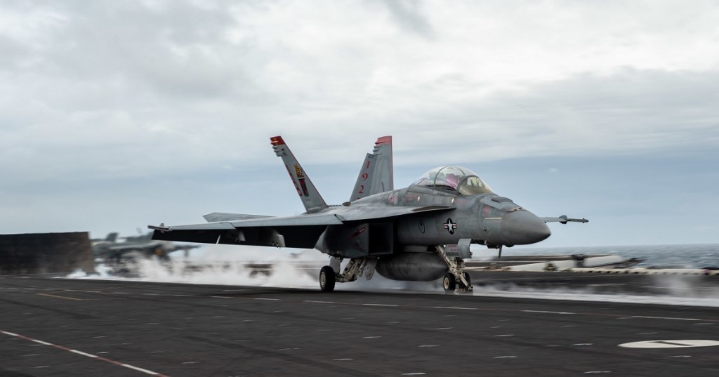 Super Hornet jet blown off carrier Harry S. Truman during rough weather