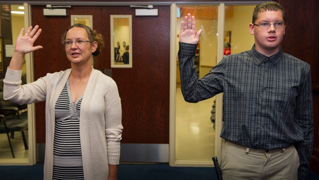 All in the Navy family — mother and son enlist together