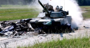Tankers smash up piles of cars in Strong Europe Tank Challenge